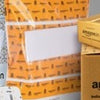 Which company supplies all corrugated boxes and packing materials to Amazon India?